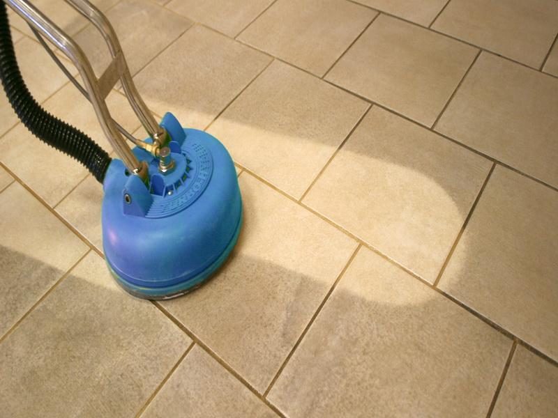 tile and grout by worker in Brisbane